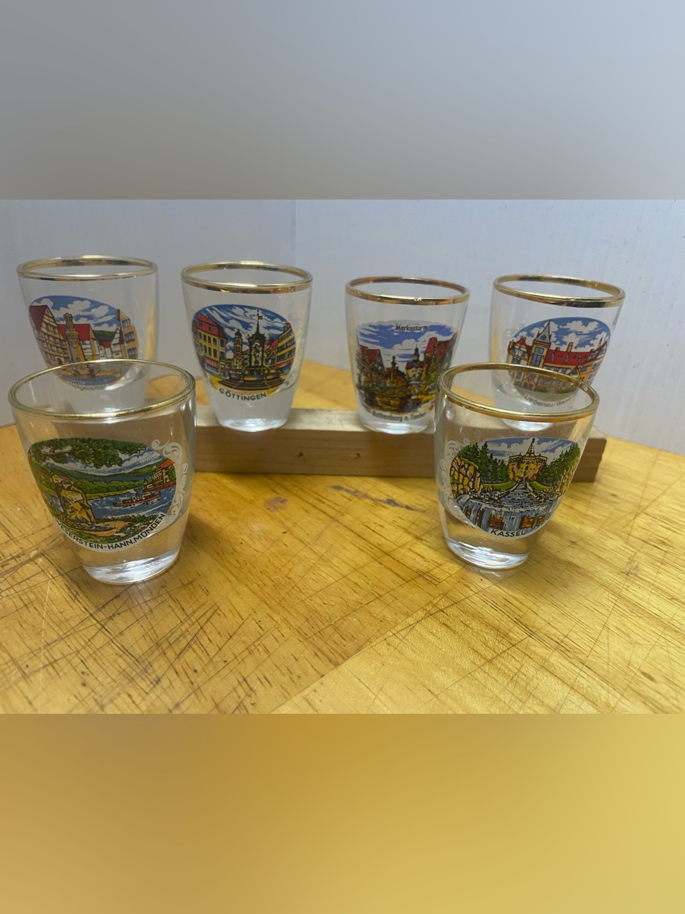 vintage souvenir German city gold rim shot glasses